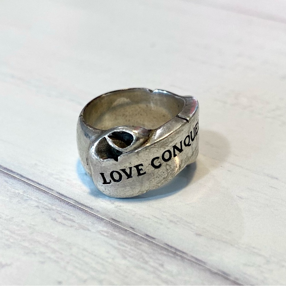 'Love Conquers' Inscription Sterling Silver Ring